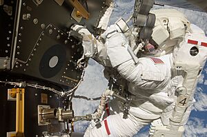 Astronaut Tom Marshburn performs his first spacewalk