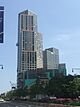  City Point Tower II, a high-rise clad in light-toned stone and dark-toned glass in irregular patterns, viewed from street level