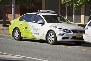 Ford FG Falcon running on LPG, operated by Canberra Elite Taxi, photographed in Tuggeranong Town Centre (1)