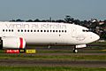 Forward fuselage of Virgin Australia (VH-YFC) Boeing 737-81D at Sydney Airport