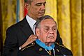 President Barack H. Obama, left, presents a Medal of Honor to former U.S. Army Master Sgt. Jose Rodela during a ceremony March 18, 2014, in the White House in Washington, D.C. The former Soldier received 140318-A-KH856-008