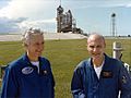 Thomas Mattingly and Henry Hartsfield in front of the Space Shuttle vehicle