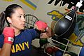 US Navy 110325-N-7544A-044 Master-at-Arms 2nd Class Nancy Mora works out on a speed bag