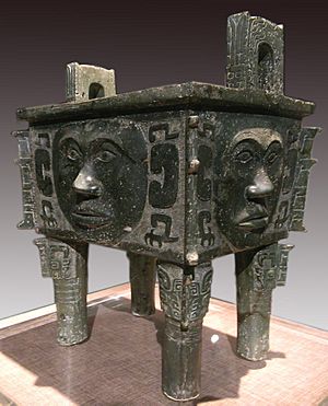 Bronze square ding (cauldron) with human faces