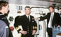 Kim Beazley and other Australian VIPs tour one of the USS Missouri's 16 inch gun turrets in 1986 (cropped)