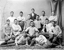 Portrait of College Football Team, The "Pirates," in Partial Uniform, and with Man in Business Suit 1879