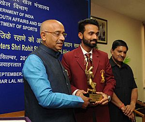 The Minister of State for Youth Affairs and Sports (IC), Water Resources, River Development and Ganga Rejuvenation, Shri Vijay Goel conferring the Arjuna Award on Cricketer Ajinkya Rahane, in New Delhi on September 16, 2016