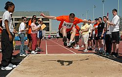 US Navy 070422-N-5215E-003 A Special Olympics athlete participates in the long jump at the Naval Academy