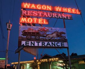 The Wagon Wheel neon sign visible from Highway 101