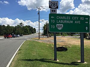 View south along Virginia State Route 281 (Airport Drive) at Charles City Road in Sandston