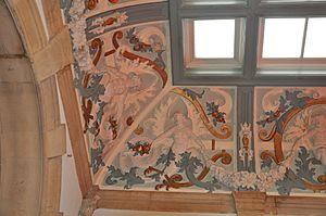 Battersea Town Hall - detail of cartouches, swags and putti making up the grand hall frieze