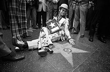 Elton John receiving his star on the Hollywood Walk of Fame