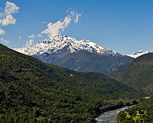 The tinguiririca volcano seen from the tinguiririca river valley chile vi region