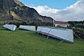 Tristan da Cunha - Longboats in front of the administrator's residence