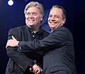 White House Chief of Staff Reince Priebus and WH Chief Strategist Steve Bannon shake hands at 2017 Conservative Political Action Conference (CPAC)