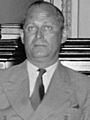 Will run senate machine while Vice President Garner is absent. Washington, D.C. June 14. While Vice President Garner is vacationing in Texas during the next few weeks, Senator Key Pittman, LCCN2016871837 (cropped to Emery L. Frazier)