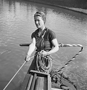 Women Run a Boat- Life on Board the Canal Barge 'Heather Bell', 1942 D7653