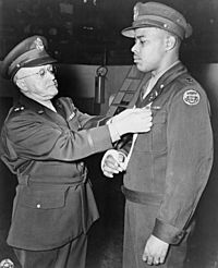 Charles L. Thomas being awarded Distinguished Service Cross