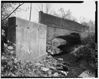 Details of west parapet, west side of barrel arch, and northwest wing wall from northwest - Ackerly Creek Bridge, South Turnpike Road (State Route 4011), Dalton, Lackawanna County, HAER PA,35-DALT,1-6.tif