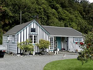 Hende's Ferry Cottage, a historic building by the bank of the Wanganui River in Hari Hari