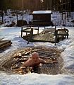 Ice swimming at summer cottage Finland