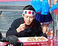Kobayashi Takeru competitive eater with hachimaki