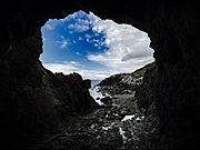 Looking out from inside Tobin's Arch at Mussel Rock