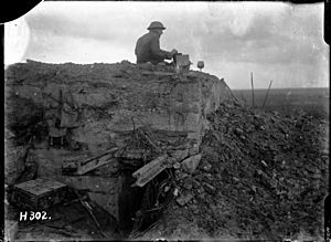 New Zealand World War 1 signaller on a German dug-out
