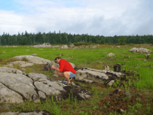 Sampling rocks at Bloody Creek crater