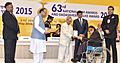 The President, Shri Pranab Mukherjee presenting the Dada Saheb Phalke Award to the Actor Shri Manoj Kumar, at the 63rd National Film Awards Function, in New Delhi