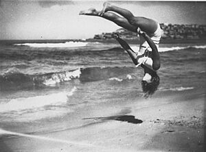 Peggy Bacon in mid-air backflip, Bondi Beach, Sydney