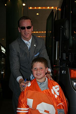 Peyton Manning in suit