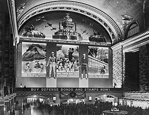 Photo mural to promote the sale of defense bonds in the concourse of Grand Central terminal