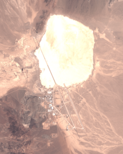 A satellite image taken in 2022 captured by Sentinel-2 of ESA showing the base with Groom Lake just to the north-northeast