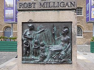 Statue of Robert Milligan, West India Quay on 9 June 2020 - relief on front of pedestel