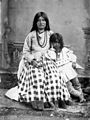 Ta-ayz-slath, wife of Geronimo, and one child