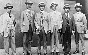 Manuel Luis Quezon, (center), with representatives from the Philippine Independence Mission (cropped)