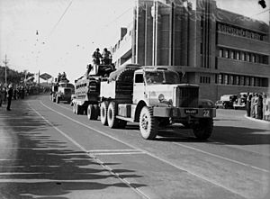 StateLibQld 1 106588 Parade of military vehicles through the streets of Brisbane, July 1942