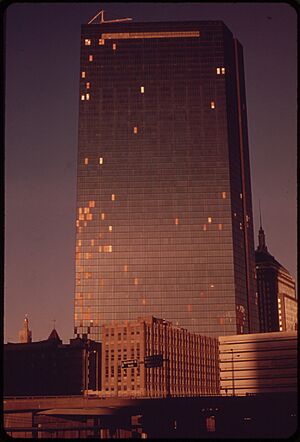 THE JOHN HANCOCK BUILDING, CONCEIVED AS A BRIGHT WINDOWED DREAM OF A SKYSCRAPER, HAS BECOME A BROKEN WINDOWED NIGHTMARE - NARA - 550007