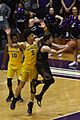 20170301 NW-UM Bryant McIntosh drives past D. J. Wilson
