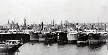 Barry docks, c. 1910, with ships moored to buoys waiting to load coal