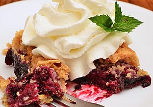 Blackberry dump cake with whipped cream