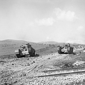 Churchill tanks go into action near Ksar Mesouar, Tunisia, 28 February 1943. NA911
