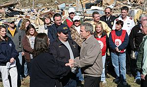 George W. Bush greets tornado victims