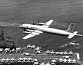 Soviet Il-38 May passing low over USS Midway (CV-41)