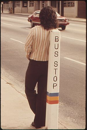 BUS STOP IS A LEANING POST FOR A PASSENGER WAITING FOR A METROPOLITAN ATLANTA RAPID TRANSIT AUTHORITY (MARTA) BUS IN... - NARA - 556799