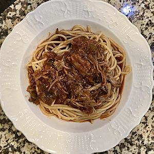 plate of spaghetti with red-brown sauce
