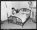 Bedroom of Eddie Cain, miner, who lives in company housing project. Adams, Rowe & Norman Inc., Porter Mine... - NARA - 540595