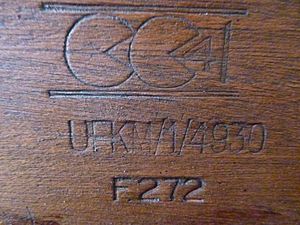 CC41 impression on rear of bookcase with maker's marks