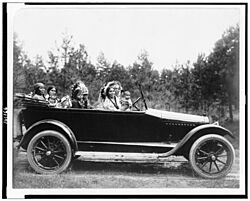 Coeur D'Alene man, Phillip Wildshoe and family, in his Chalmers automobile LCCN90710980